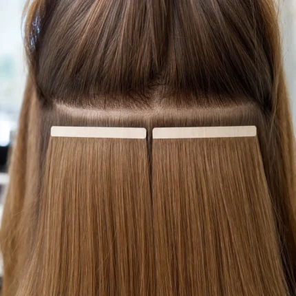 Two 3-inch Truly Seamless tape wefts placed side by side across the back of the head at the attachment point.